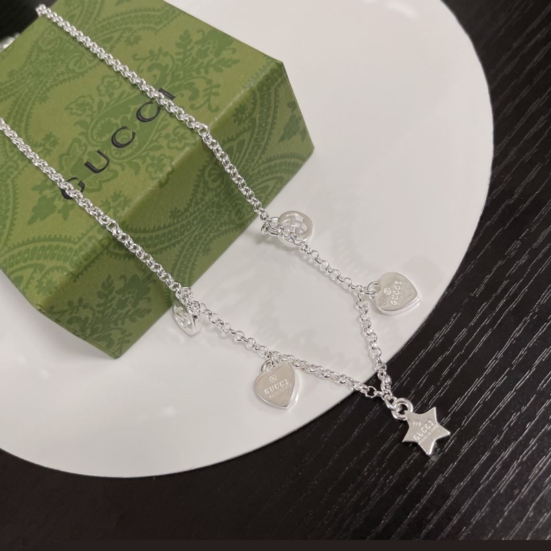 G*u*i necklaces